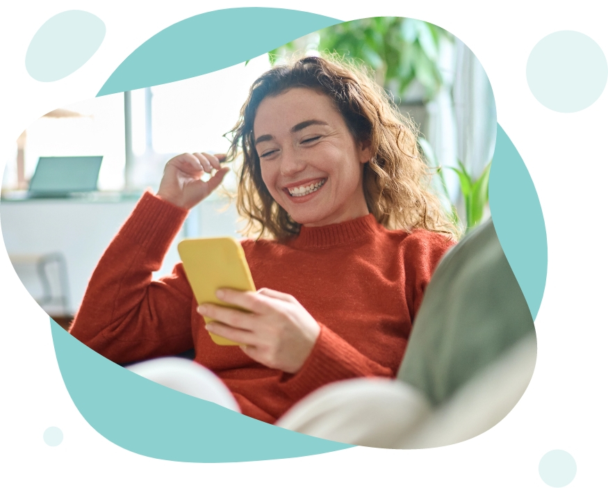 Smiley lady using her phone image